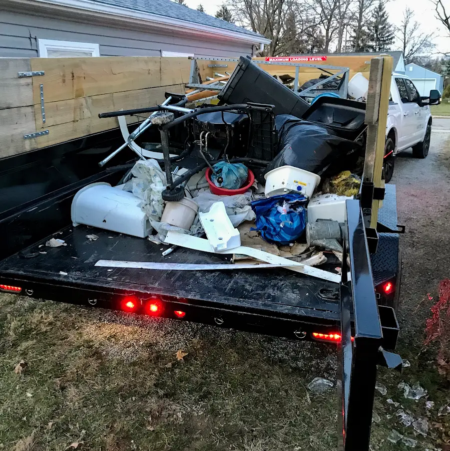 Roll-off dumpster delivered to a residential driveway in Kemp Mill
